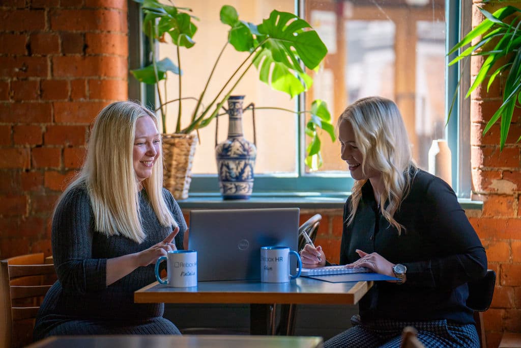 Natalie and Faye from the Rebox HR team working together